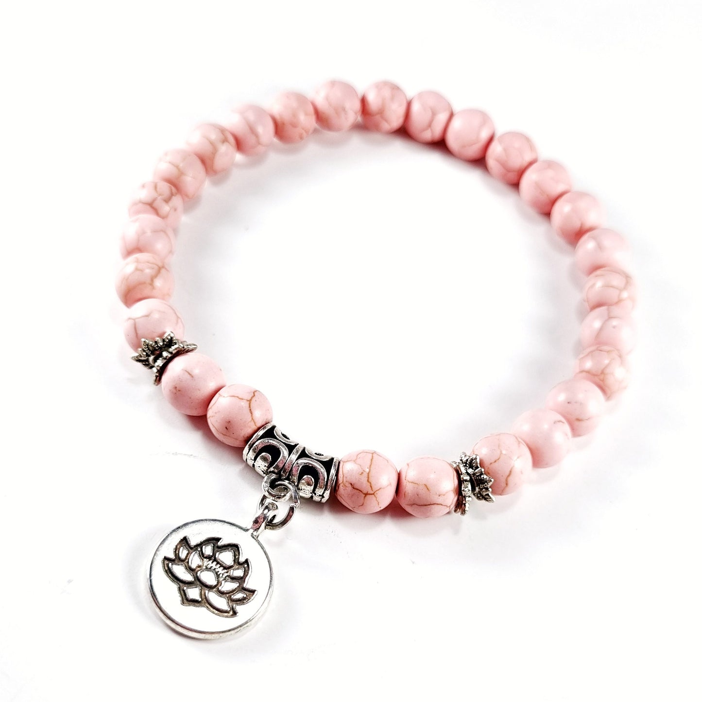 Pulsera piedra natural howlita rosa con dije de loto
