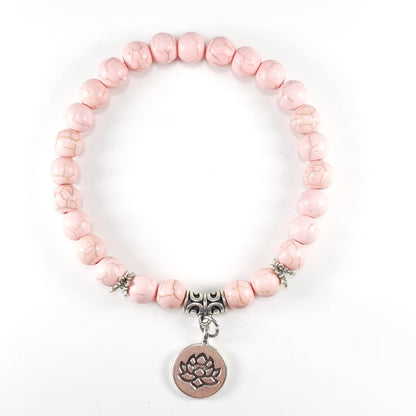 Pulsera piedra natural howlita rosa con dije de loto